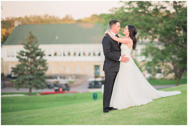 Bride and groom portraits at sunset at a Minneapolis golf course wedding. Photo by Kayla Lee.