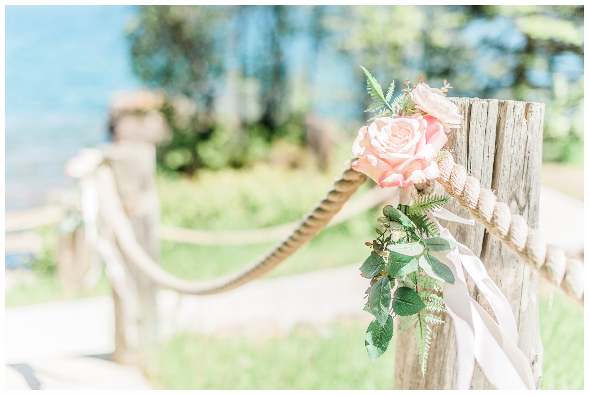 Roses on a dock post from a summer Bluefin Bay Wedding. Photo by Kayla Lee.