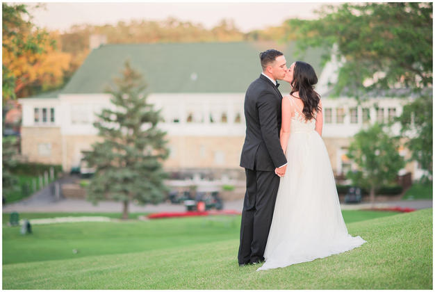 Bride and groom portraits at sunset at a Minneapolis golf course wedding. Photo by Kayla Lee.