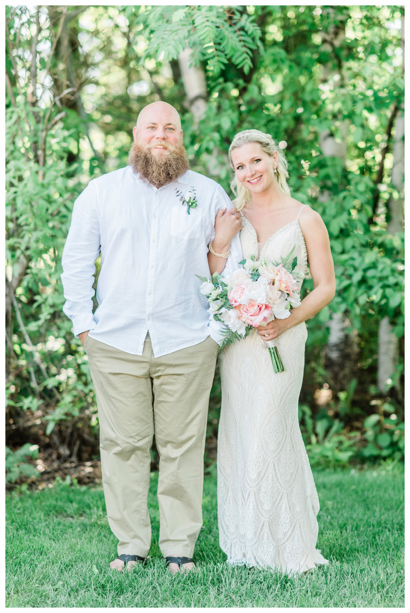 Bride and groom portraits from a summer Bluefin Bay Wedding. Photo by Kayla Lee.