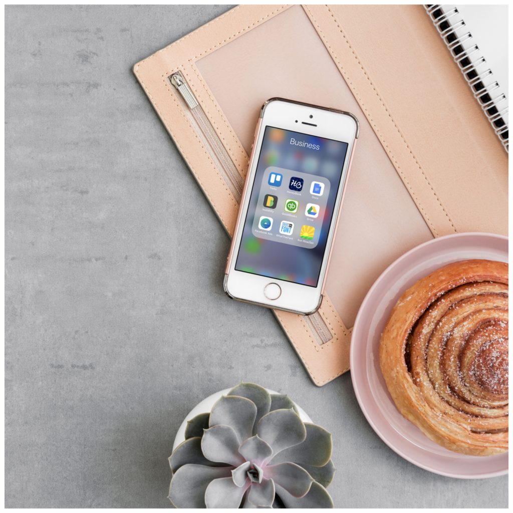Cinnamon roll, succulent, planner, and smart phone loaded with five of the most helpful apps for business. You are ready for the day!