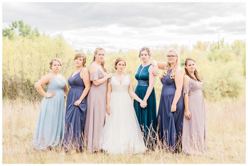 Let your ladies express themselves while still fitting your wedding style. Here are three tips for bridesmaid dress shopping. Photo by Kayla Lee.