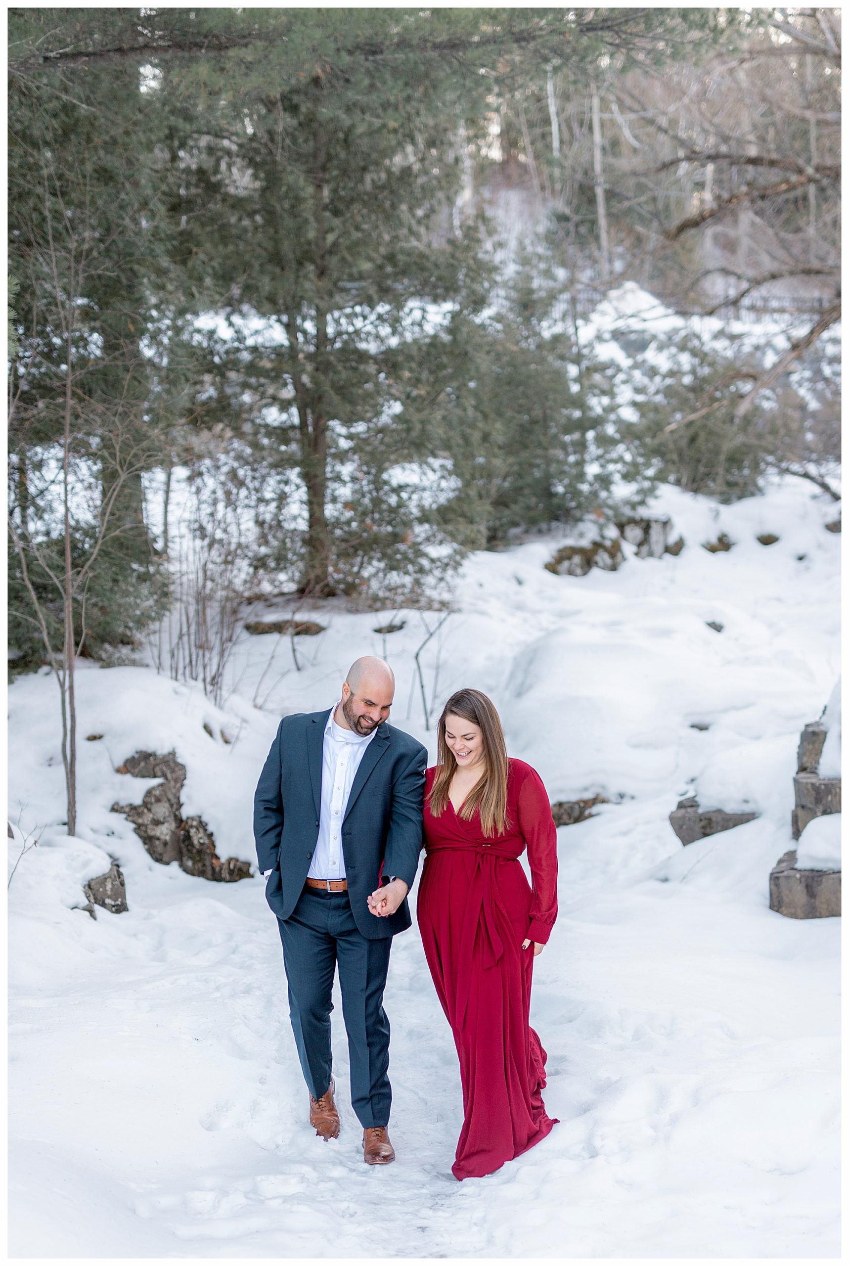 Maroon dress and navy suit at a Chester Bowl Engagement in Duluth, Minnesota. Photography by Kayla Lee.