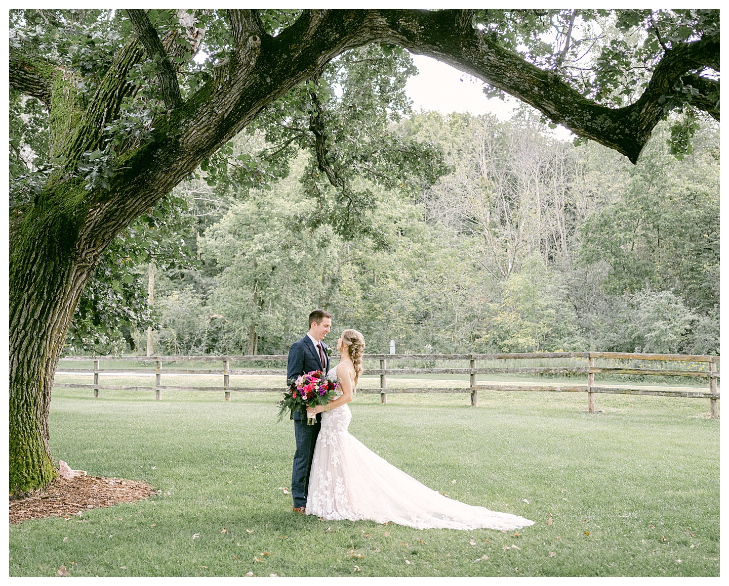 A bride and groom's portrait at a Mayowood Stone Barn Wedding. Photo by Kayla Lee.