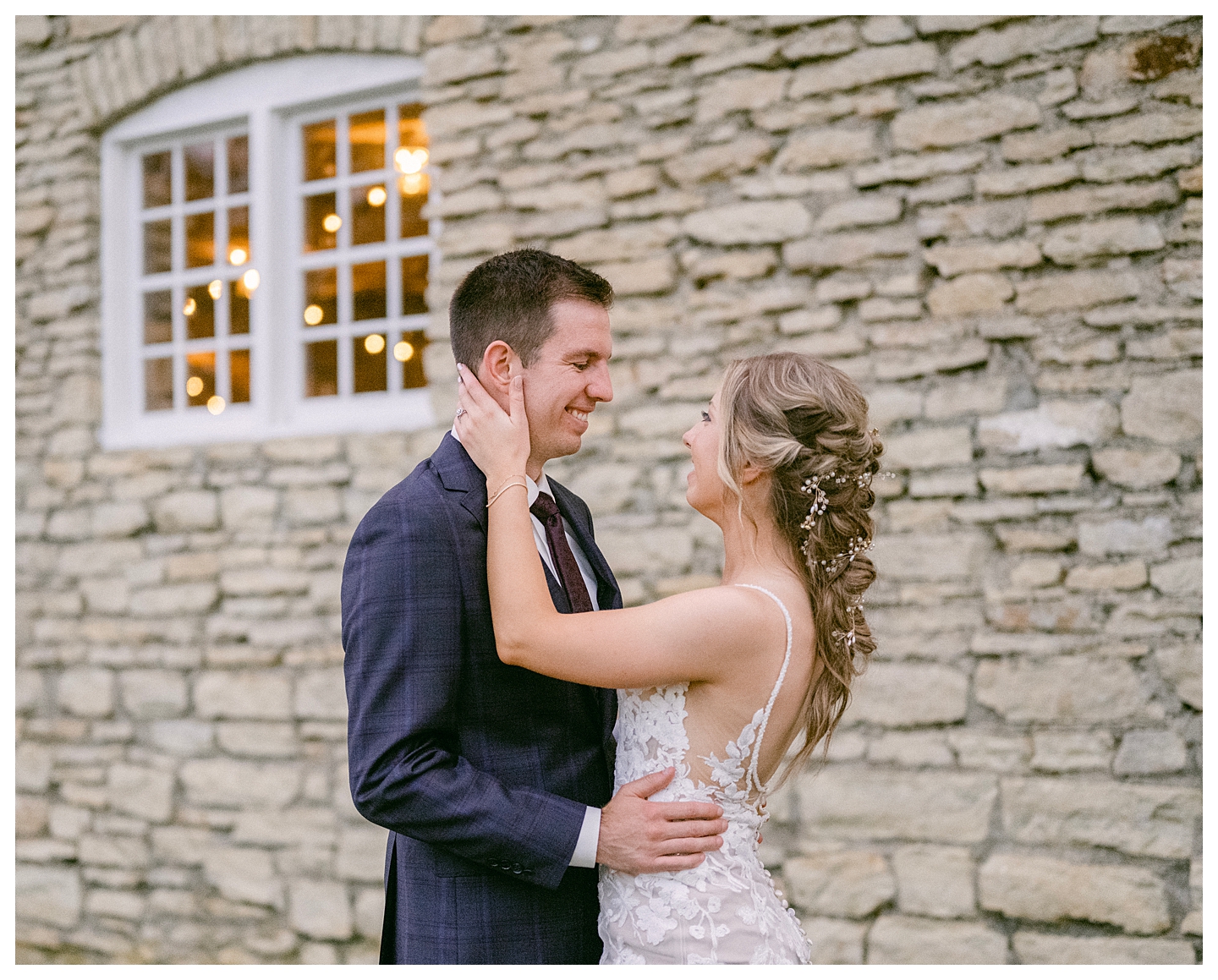 A bride and groom's sunset portrait at a Mayowood Stone Barn Wedding. Photo by Kayla Lee.